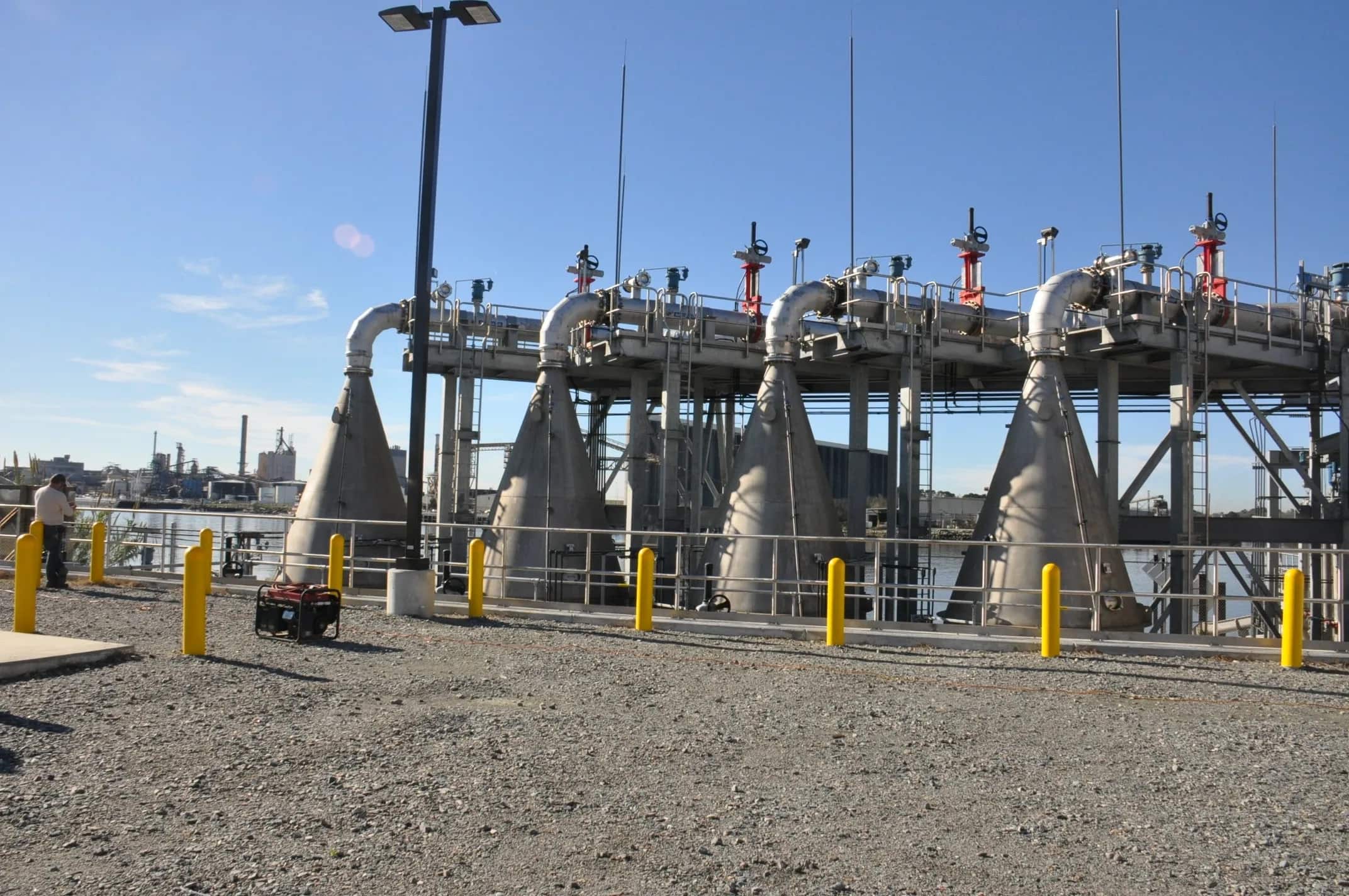 Row of stainless steel Superoxygenation cones installed at a large-scale water treatment intake facility